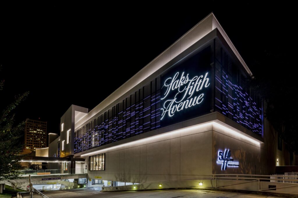 Saks Fifth Avenue in Huston, Texas, exterior at night with a lighted facade